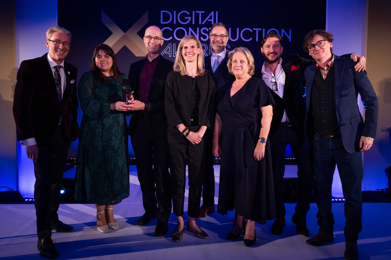 Laing O'Rourke and the University of Oxford team collect their trophy from Ed Byrne (far right), Enrique Philip from Sage (second right) and Justin Stanton of Digital Construction Plus (far left). Image: © 2026 - ASV Photography Ltd. www.ASVphotos.com
